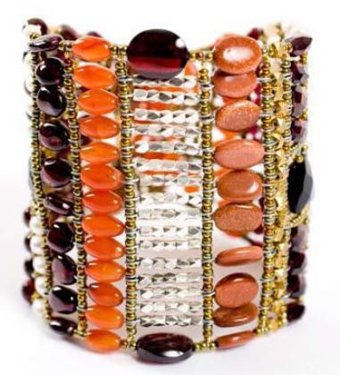 This wide, high-fashioin Ziio bracelet is an Italian artisan masterpiece handmade with garnets, cornaline, pearls and sterling silver. 
