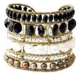 Black and white Ziio bracelet is a a handmade artisan bracelet with pearls, black tourmaline and sterling silver.