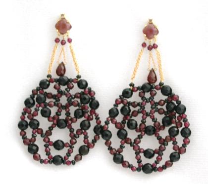 Italian high-fashion chandelier earrings handmade with 18k gold, black spinels, onyx, garnets and diamonts