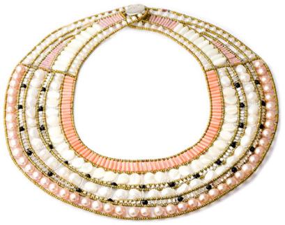 A bold, high-fashion statement necklace by Ziio. This stunning example of Ziio design and craftsmanship is made with pink pearls, white pearls, mother of pearl, black tourmaline, coral and sterling silver.